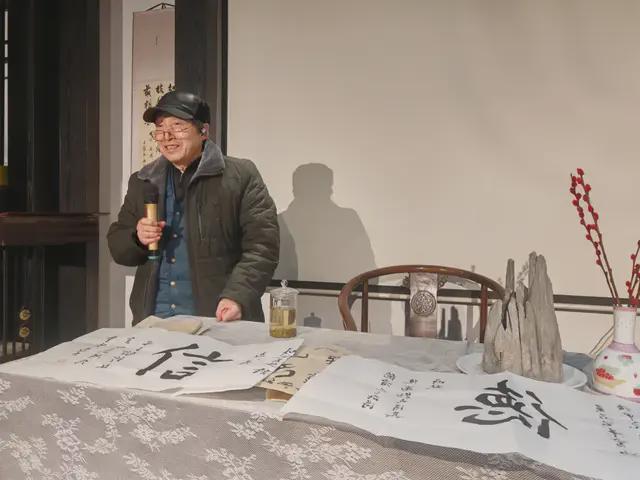 春茶话会在沙坪坝区国仁源大茶荟举行AG真人“金蛇狂舞 儒风家国”迎(图2)